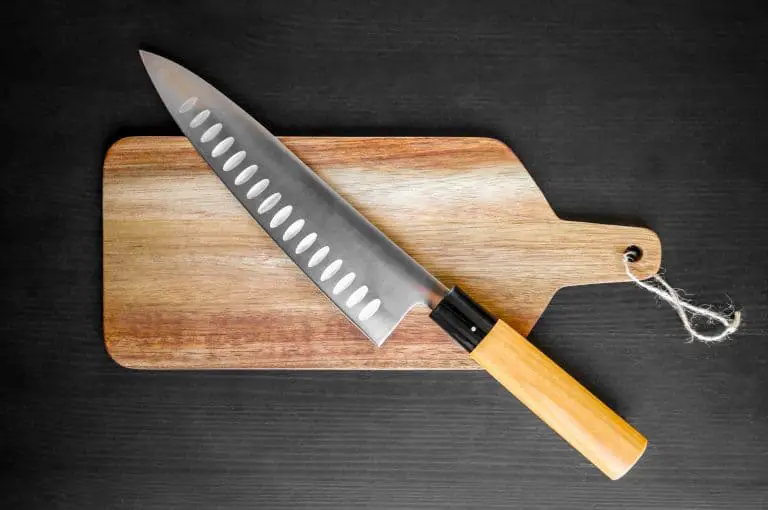 gyuto knife on a cutting board